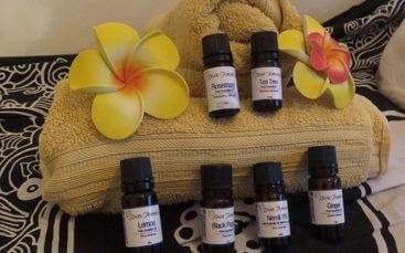 Photo of aromatherapy oils and soft towels